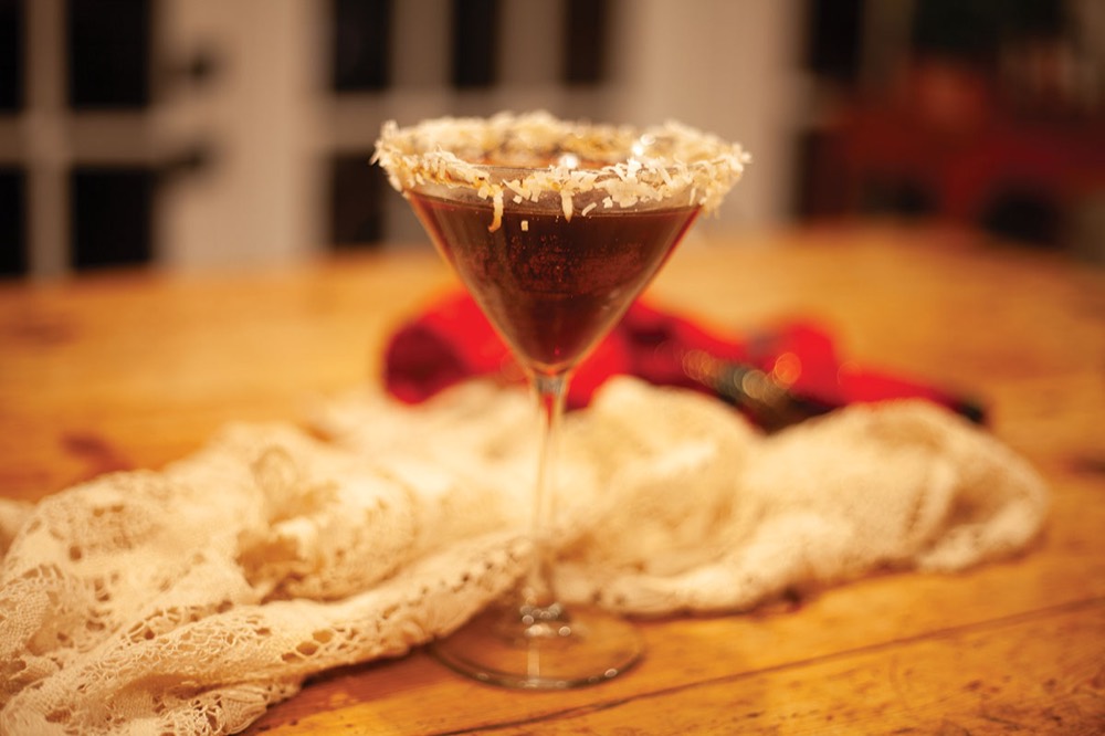 Winter sangria in a glass beverage dispenser