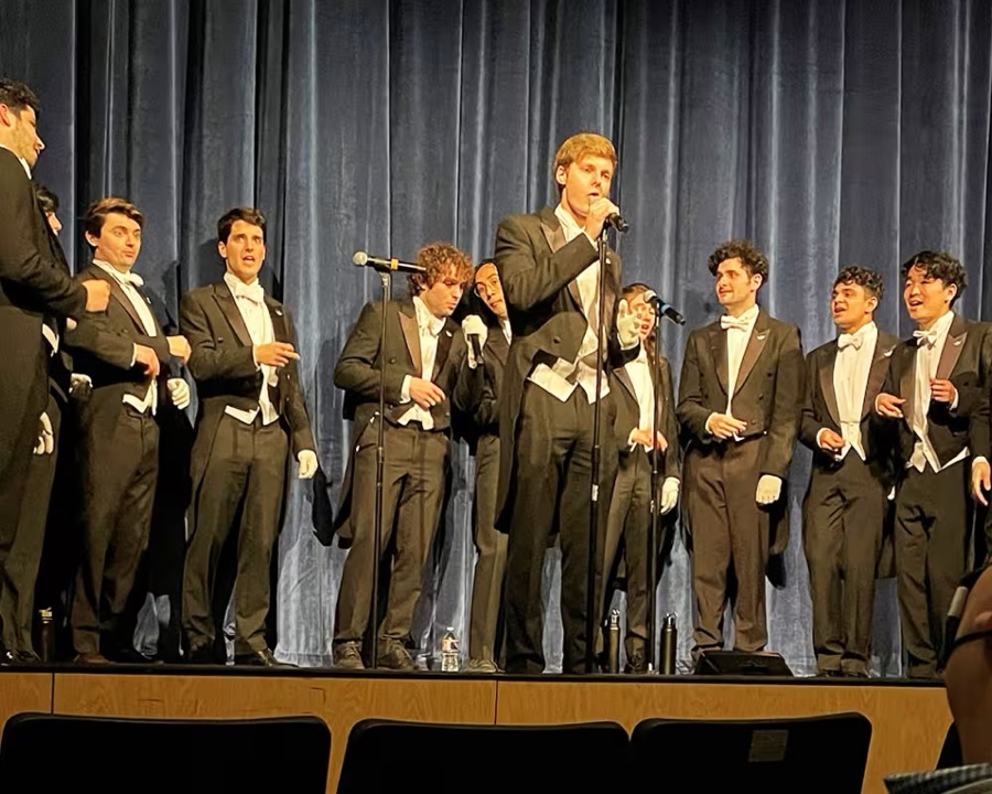 The Yale Whiffenpoofs performing on stage in Houston